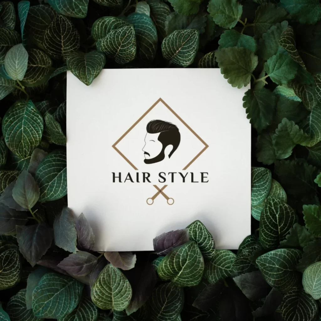 Logo composé d'une personne et d'un cadre en forme des ciseaux créé pour un salon de coiffure qui se nomme hair style